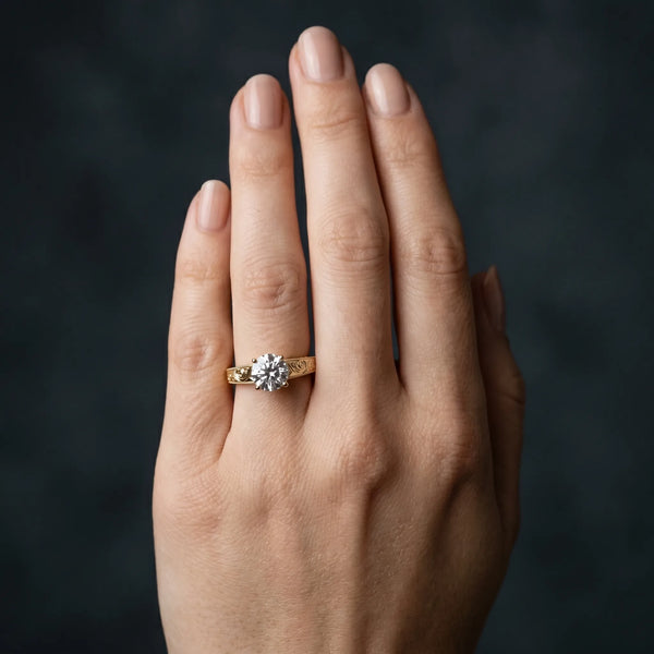 Yellow gold Round Solitaire Diamond with Engraved Band and Four-Prong Setting