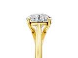 Yellow gold Round Solitaire Engagement Ring with Four-Prong Setting and Classic Band