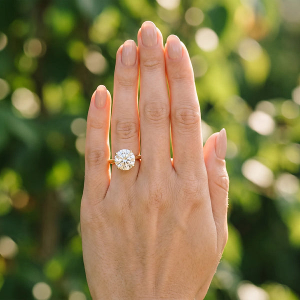 Yellow gold Round Solitaire Heart Prong Engagement Ring with Tapered Band