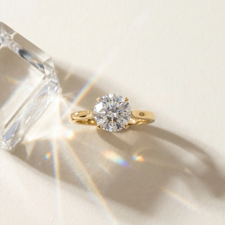 Yellow gold Round Solitaire Heart Prong Engagement Ring with Tapered Band