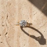 Yellow gold Round Solitaire Leaf-Inspired Diamond Ring with Pavé Band and Four-Prong Setting_7