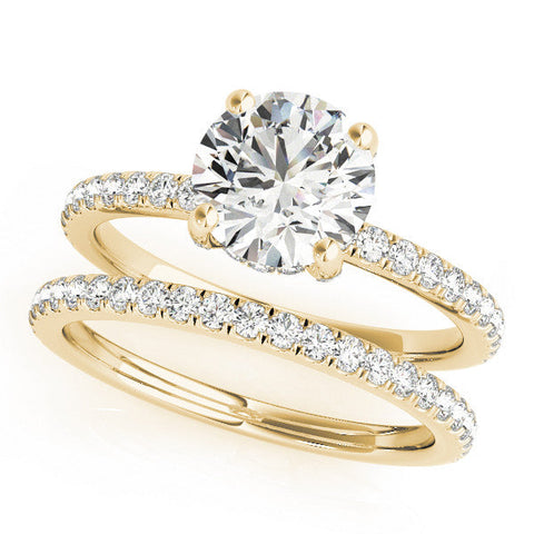 Yellow gold Fancy Black Pear Cut Diamond Solitaire Ring with Four-Prong Setting and Pavé Band