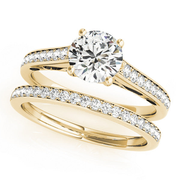 Yellow gold Round Solitaire Prong Set Diamond Engagement Ring with Pave Band