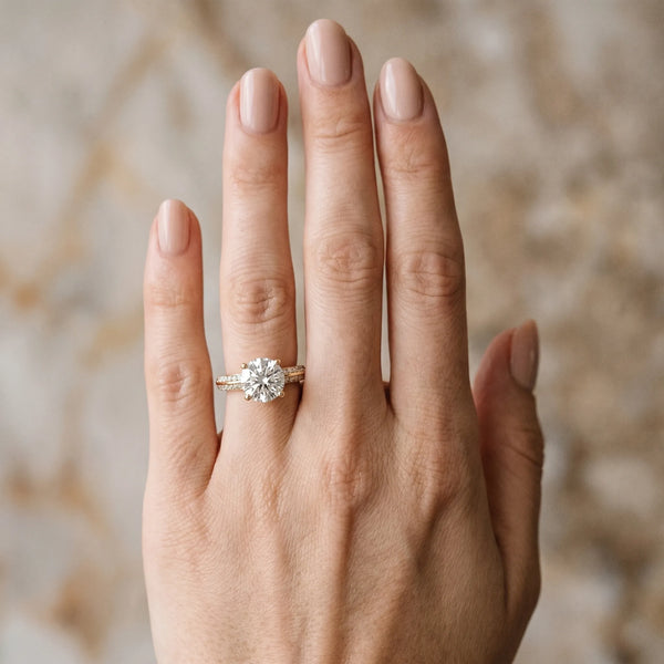 Yellow gold Round Solitaire Split Shank Pave Diamond Engagement Ring with Four-Prong Setting