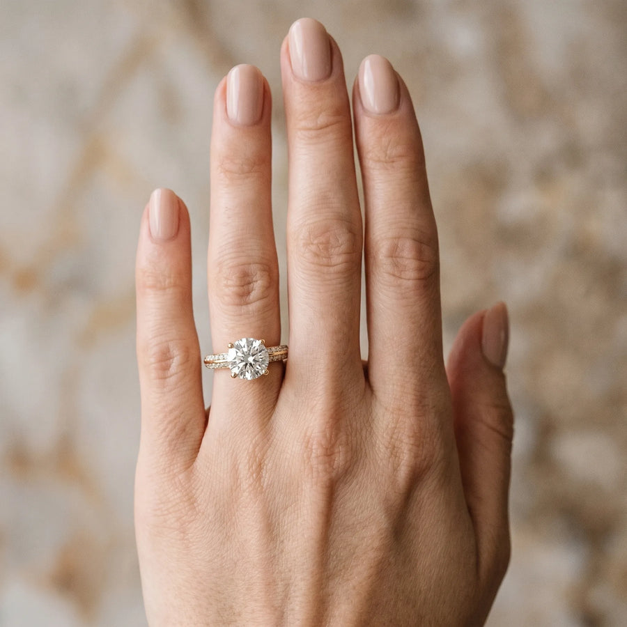 Yellow gold Round Solitaire Split Shank Pave Diamond Engagement Ring with Four-Prong Setting
