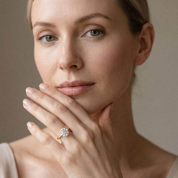 Yellow gold Round Solitaire Twist Band Ring with Four-Prong Setting