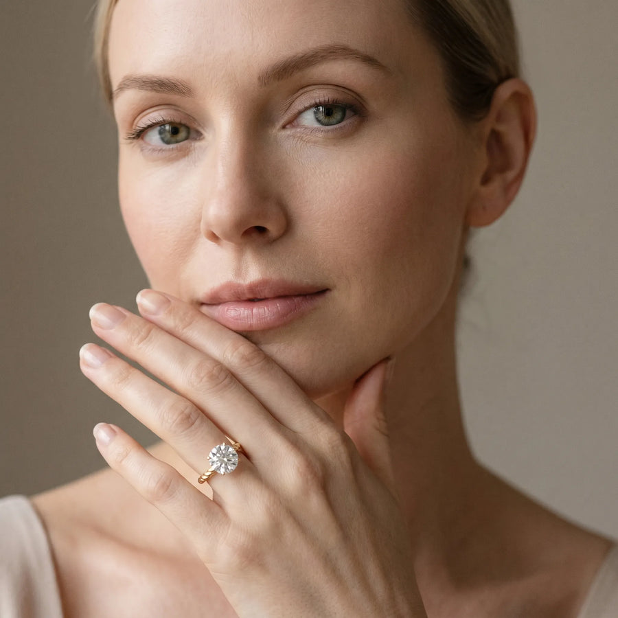 Yellow gold Round Solitaire Twist Band Ring with Four-Prong Setting