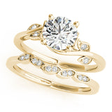 Yellow gold Round Solitaire Twist Engagement Ring with Leaf Accents and Prong Setting 1