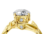 Yellow gold Round Solitaire Twist Engagement Ring with Leaf Accents and Prong Setting_19