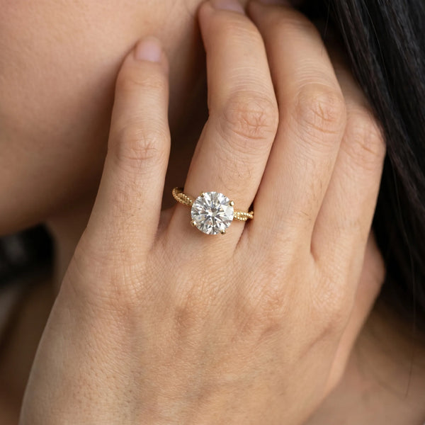 Yellow gold Round Solitaire Twisted Band with Bead Prong Setting