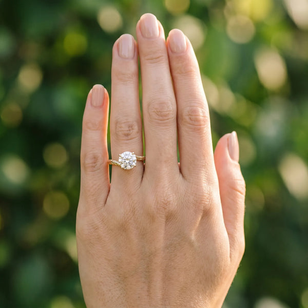 Yellow gold Round Solitaire Twisted Band with Four-Prong Setting