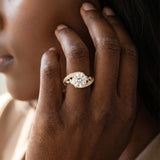 Yellow gold Round Solitaire with Pavé Twist Band and Four-Prong Setting_15