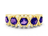 Yellow gold Round Tanzanite Channel Set Band with X-Prong Detail_6