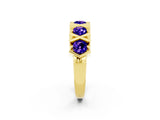 Yellow gold Round Tanzanite Channel Set Band with X-Prong Detail_8