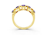 Yellow gold Round Tanzanite Channel Set Band with X-Prong Detail_9