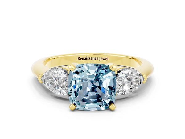 Yellow gold Three-Stone Cushion Cut Aquamarine Ring with Pear Side Stones and Four-Prong Setting