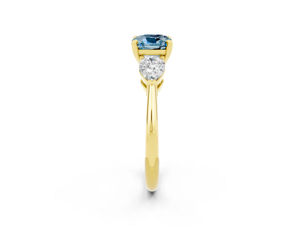 Yellow gold Three-Stone Cushion Cut Aquamarine Ring with Pear Side Stones and Four-Prong Setting