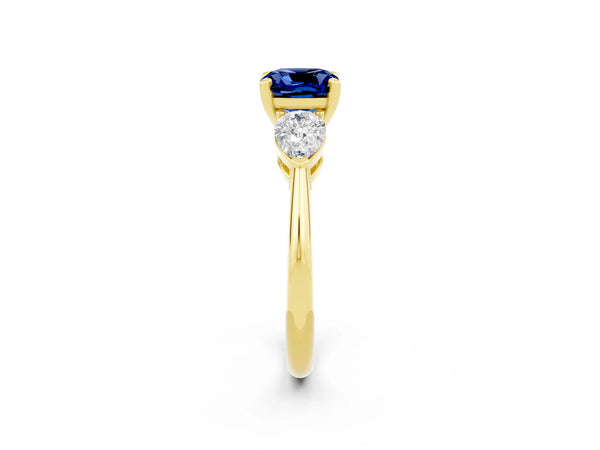 Yellow gold Three-Stone Cushion Cut Blue Sapphire Ring with Pear Side Stones and Four-Prong Setting