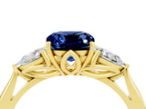 Yellow gold Three-Stone Cushion Cut Blue Sapphire Ring with Pear  Side Stones in Four-Prong Setting_40