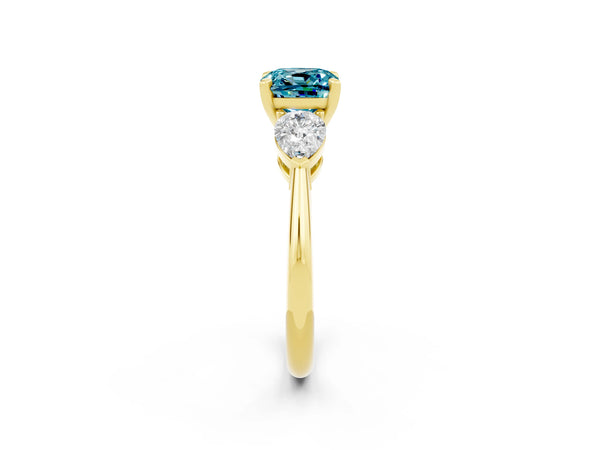 Yellow gold Three-Stone Cushion Cut Blue Topaz Ring with Pear Side Stones and Four-Prong Setting