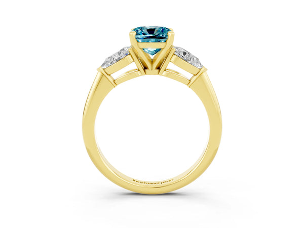 Yellow gold Three-Stone Cushion Cut Blue Topaz Ring with Pear Side Stones and Four-Prong Setting