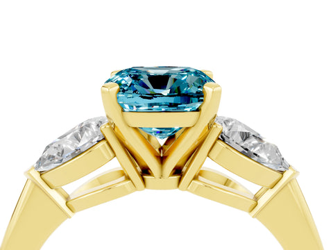 Yellow gold Three-Stone Cushion Cut Blue Topaz Ring with Pear Side Stones and Four-Prong Setting_4