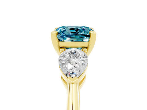 Yellow gold Three-Stone Cushion Cut Blue Topaz Ring with Pear Side Stones and Four-Prong Setting_5