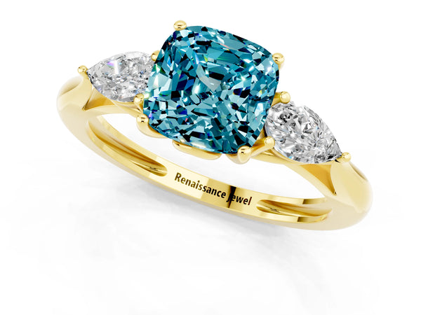 Yellow gold Three-Stone Cushion Cut Blue Topaz Ring with Pear  Side Stones in Four-Prong Setting