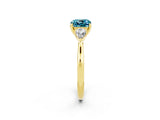 Yellow gold Three-Stone Cushion Cut Blue Topaz Ring with Pear  Side Stones in Four-Prong Setting_14