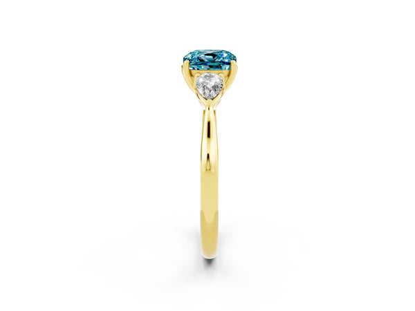 Yellow gold Three-Stone Cushion Cut Blue Topaz Ring with Pear  Side Stones in Four-Prong Setting