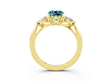 Yellow gold Three-Stone Cushion Cut Blue Topaz Ring with Pear  Side Stones in Four-Prong Setting_15