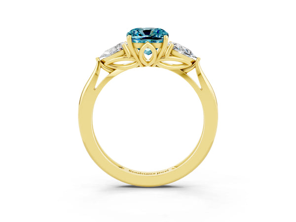 Yellow gold Three-Stone Cushion Cut Blue Topaz Ring with Pear  Side Stones in Four-Prong Setting