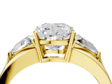 Yellow gold Three-Stone Cushion Cut Cut Diamond Ring with Trillion Side Stones on a Split Shank Band_13