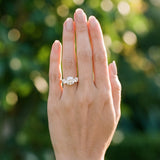 Yellow gold Three-Stone Cushion Cut Diamond Engagement Ring with Prong Setting on a White Gold Band_18