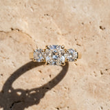 Yellow gold Three-Stone Cushion Cut Diamond Ring with Round Accent Stones, Prong Setting, and Classic Band_6