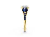 Yellow gold Three-Stone Cushion Cut Diamond Ring with Round with Blue Sapphire side stone Pavé Band and Prong Setting_2