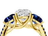 Yellow gold Three-Stone Cushion Cut Diamond Ring with Round with Blue Sapphire side stone Pavé Band and Prong Setting_4