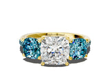 Yellow gold Three-Stone Cushion Cut Diamond Ring with Round with Blue Topaz side stone Pavé Band and Prong Setting