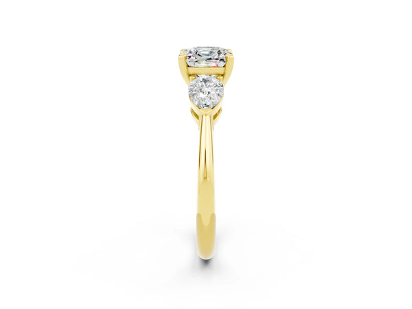 Yellow gold Three-Stone Cushion Cut Moissanite Ring with Pear Side Stones and Four-Prong Setting