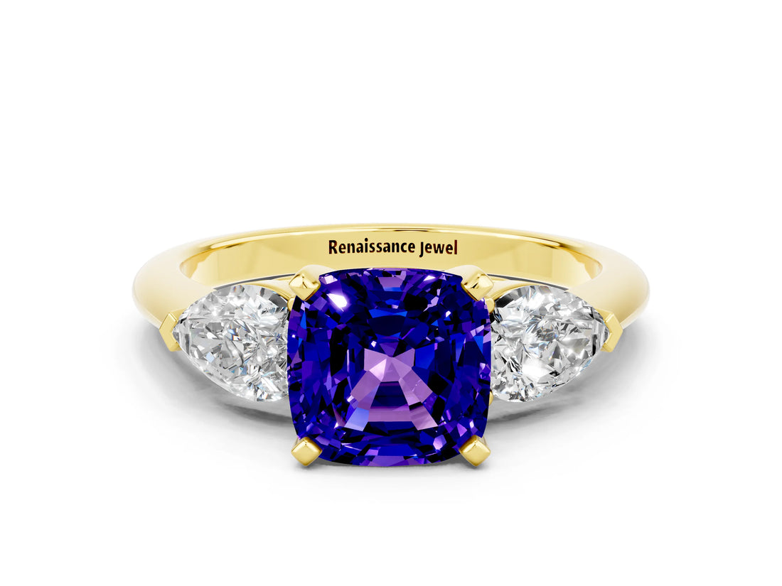 Yellow gold Three-Stone Cushion Cut Tanzanite Ring with Pear Side Stones and Four-Prong Setting