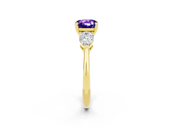 Yellow gold Three-Stone Cushion Cut Tanzanite Ring with Pear Side Stones and Four-Prong Setting
