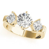 Yellow gold Three-Stone Cushion and Princess Cut Diamond Ring with Channel Band and Four-Prong Setting