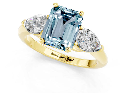 Yellow gold Three-Stone Emerald Cut Aquamarine Ring with Pear Side Stones and Four-Prong Setting_1