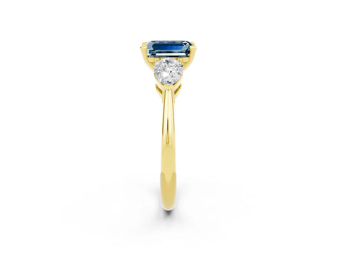 Yellow gold Three-Stone Emerald Cut Aquamarine Ring with Pear Side Stones and Four-Prong Setting_2