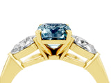 Yellow gold Three-Stone Emerald Cut Aquamarine Ring with Pear Side Stones and Four-Prong Setting_4