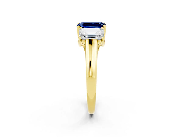 Yellow gold Three-Stone Emerald Cut Blue Sapphire Engagement Ring with Prong Setting