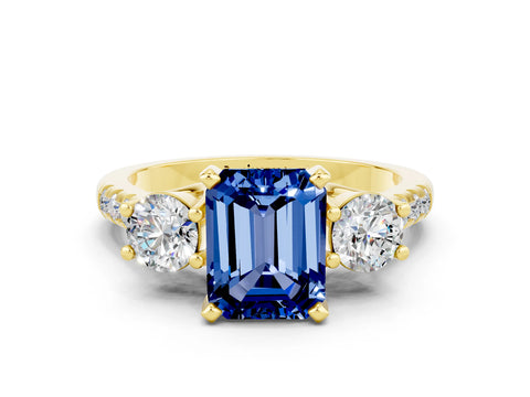 Yellow gold Three-Stone Emerald Cut Blue Sapphire Pavé Band with Four-Prong Setting