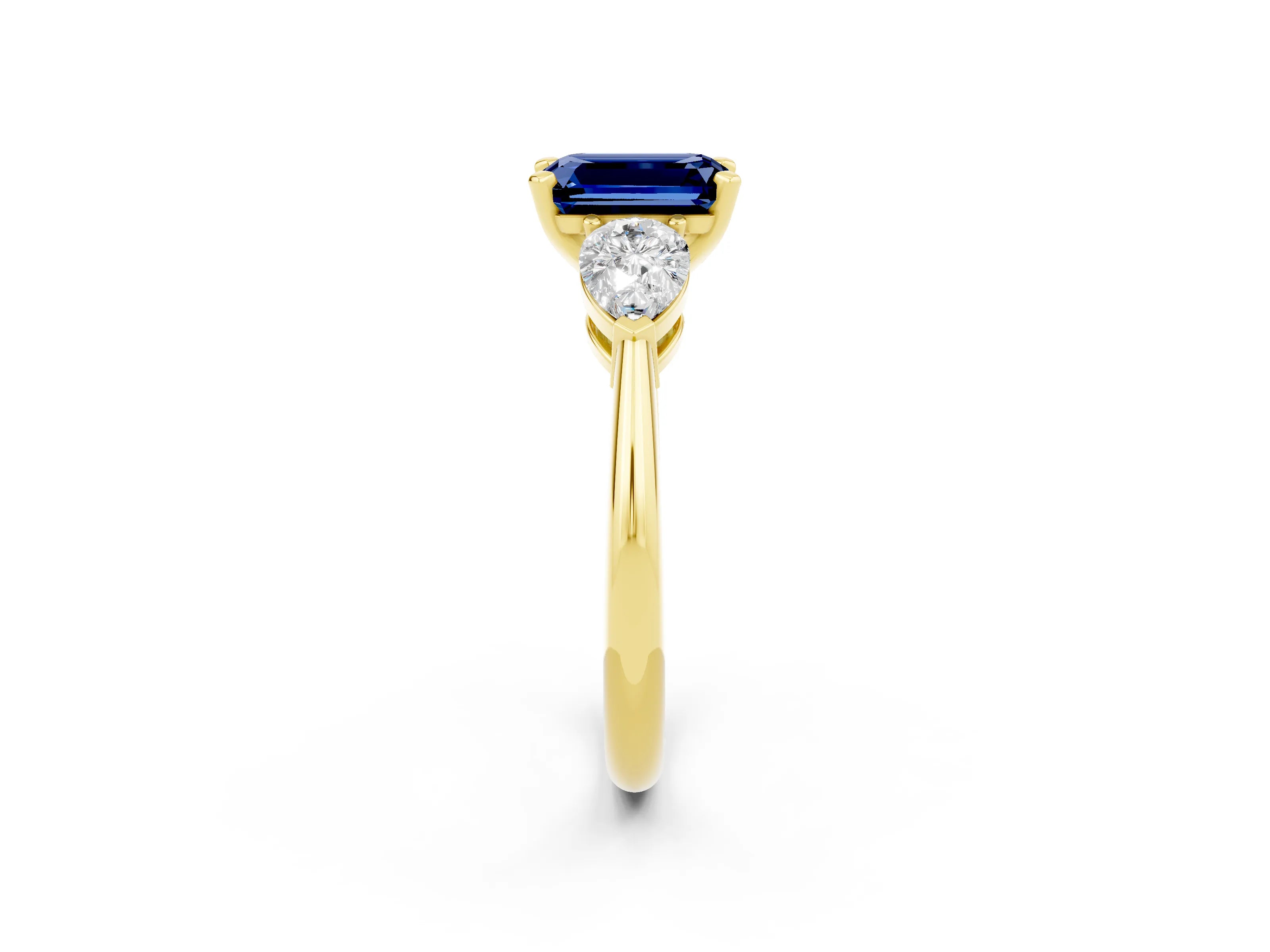 Yellow gold Three-Stone Emerald Cut Blue Sapphire Ring with Pear Side Stones and Four-Prong Setting_2