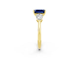 Yellow gold Three-Stone Emerald Cut Blue Sapphire Ring with Pear Side Stones and Four-Prong Setting_2