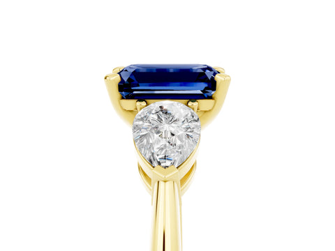 Yellow gold Three-Stone Emerald Cut Blue Sapphire Ring with Pear Side Stones and Four-Prong Setting_5